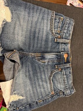 Women’s Blue Distressed Denim Shorts